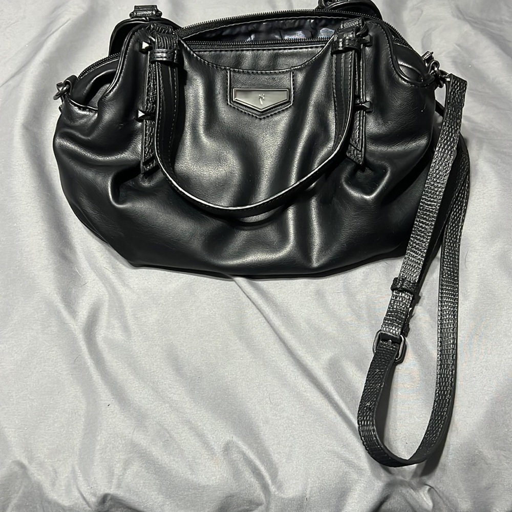 Simply Vera wang convertible crossbody. 3 different compartments.